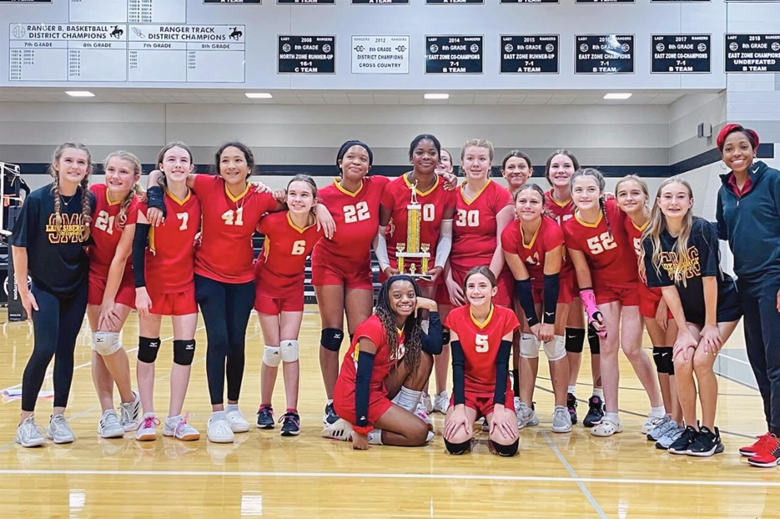The Smith seventh grade volleyball B team poses after winning the CFISD Middle School “B” Volleyball Tournament.